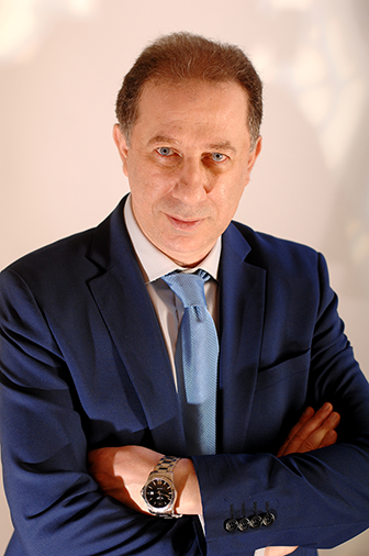 A photo or Nemer Richmany, a man in looking at the camera sternly. 